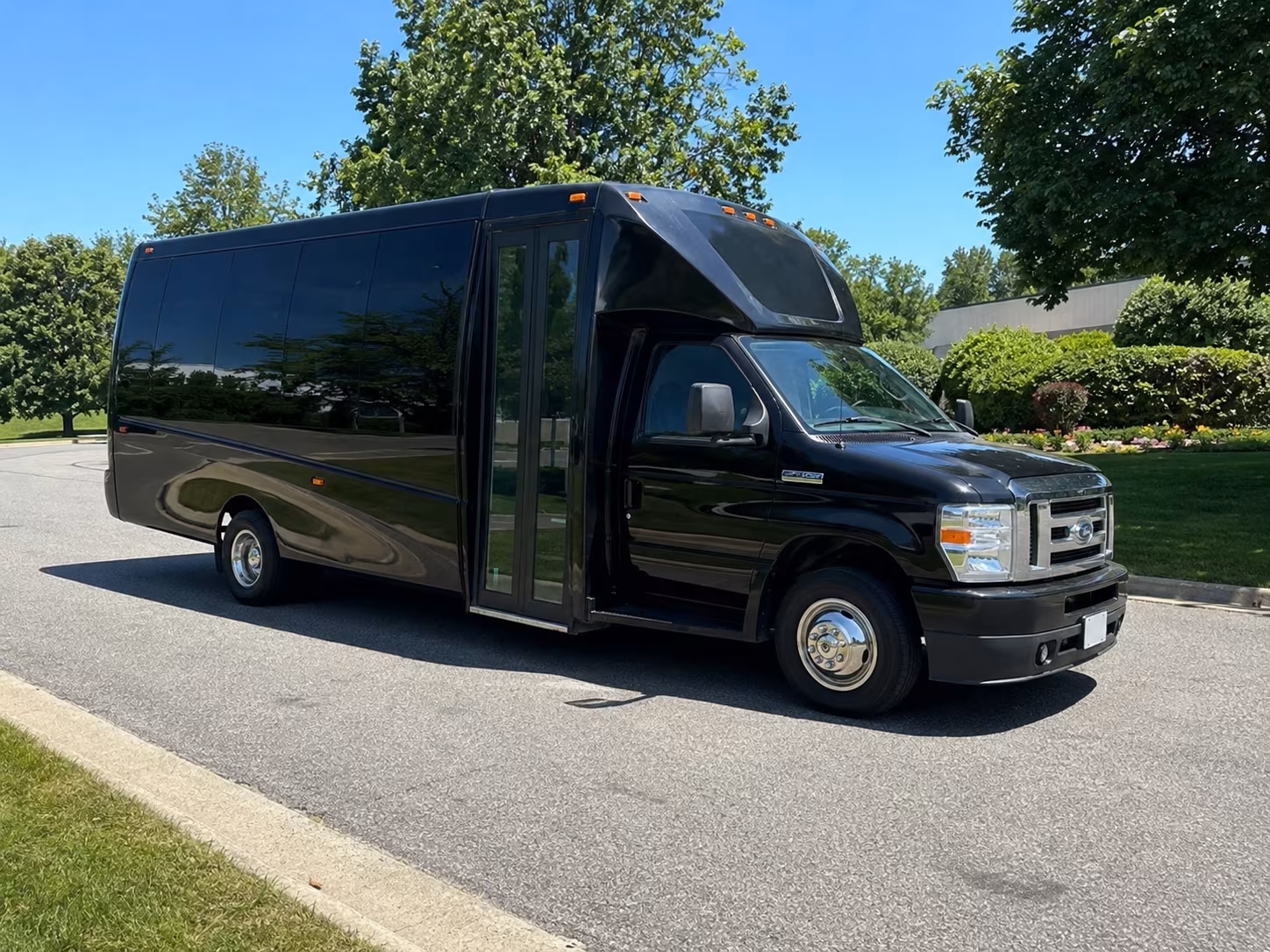 Wedding guests seated inside a party bus serving Mesa